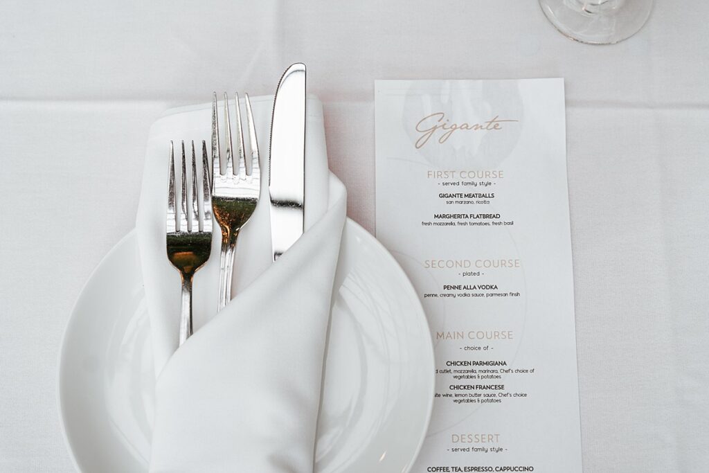 A wedding place setting is photographed at a Westchester wedding reception